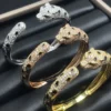 Panthère de Cartier bracelet, medium model, half-paved