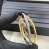 Trinity bracelet, small model, half-paved
