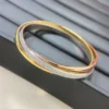 Trinity bracelet, small model, half-paved