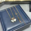Chopard happy hearts necklace ,three hearts, one diamond