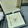 Chopard happy hearts necklace ,three hearts, one diamond