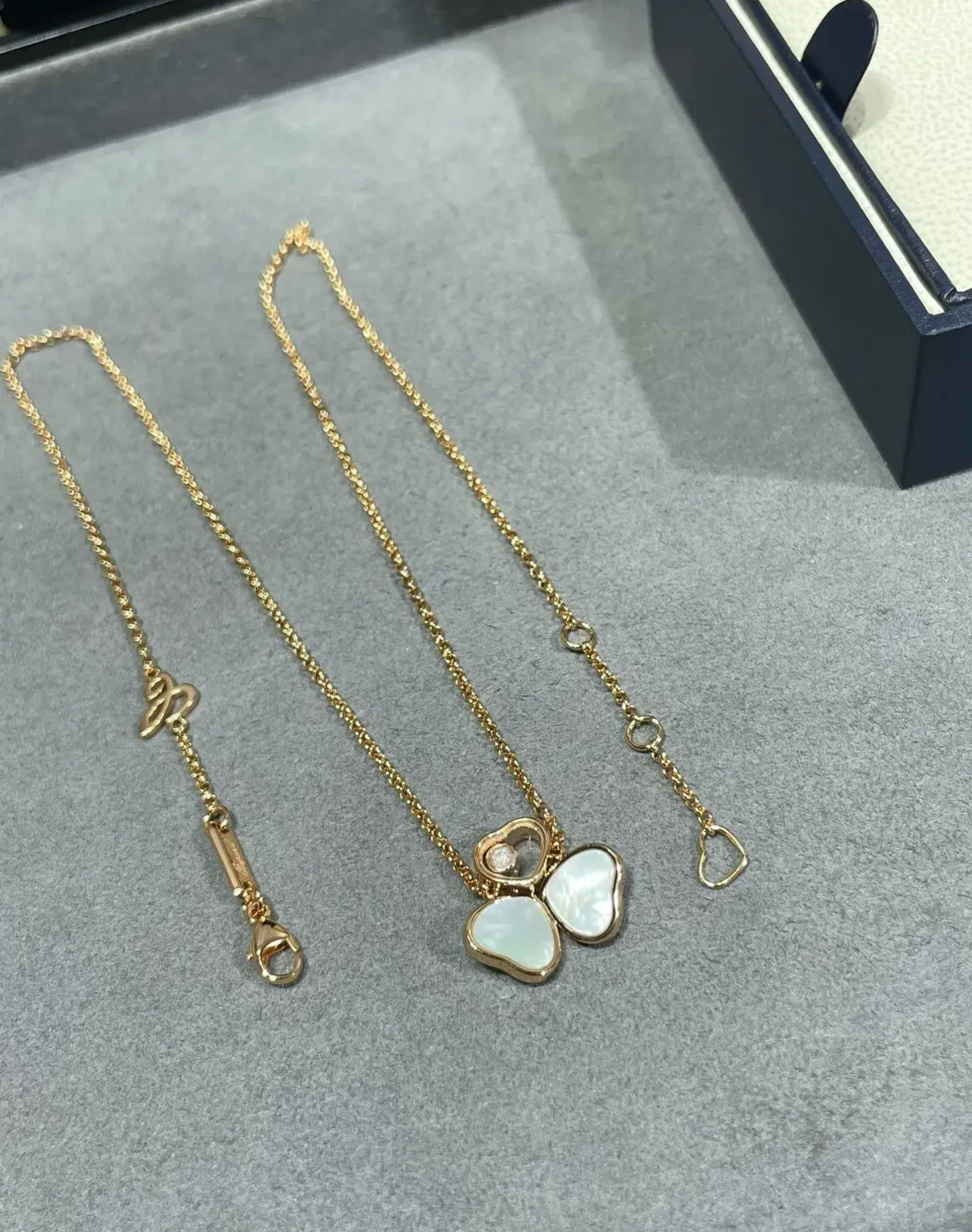 Chopard happy hearts necklace ,three hearts, one diamond