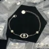 Petit CD Jolie Bracelet Necklace