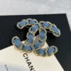 Metal Denim Gold Blue CHANEL Brooch