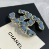 Metal Denim Gold Blue CHANEL Brooch
