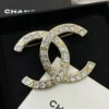 CHANEL crystal cc logo brooch