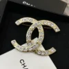 CHANEL crystal cc logo brooch