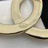 CHANEL crystal cc logo brooch
