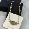 Chanel Necklace – Metal, glass pearls & strass, gold, pearly white & multicolor