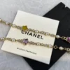 Chanel Necklace – Metal, glass pearls & strass, gold, pearly white & multicolor