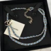 Chanel double CHANEL denim & metal necklace