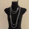 Chanel double CHANEL denim & metal necklace