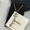 Chanel necklace ,Silver-toned chain with crystal CC pendant