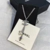 Chanel necklace ,Silver-toned chain with crystal CC pendant