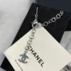 Chanel necklace ,Silver-toned chain with crystal CC pendant