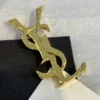 YSL Metal brooch