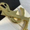 YSL Metal brooch