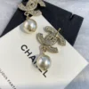 CC Logo Chanel pearl earrings