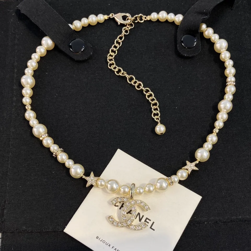 Chanel Pearl-crystal choker with cc logo and stars