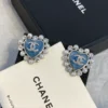 CC Logo Chanel blue heart earrings