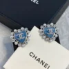 CC Logo Chanel blue heart earrings
