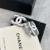 CC Logo Chanel white enamel earrings