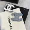 CC Logo Chanel white enamel earrings