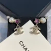 CHANEL earrings with stars and pearls