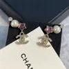 CHANEL earrings with stars and pearls