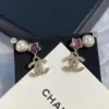 CHANEL earrings with stars and pearls