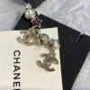 CHANEL earrings with stars and pearls