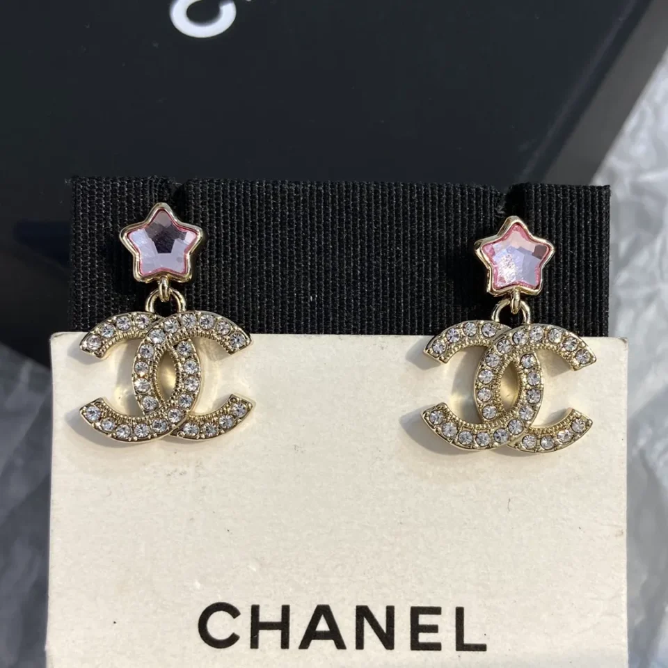 CHANEL earrings with stars on  the top