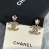 CHANEL earrings with stars on  the top