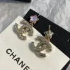 CHANEL earrings with stars on  the top