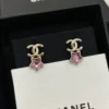 CHANEL earrings with purple stars