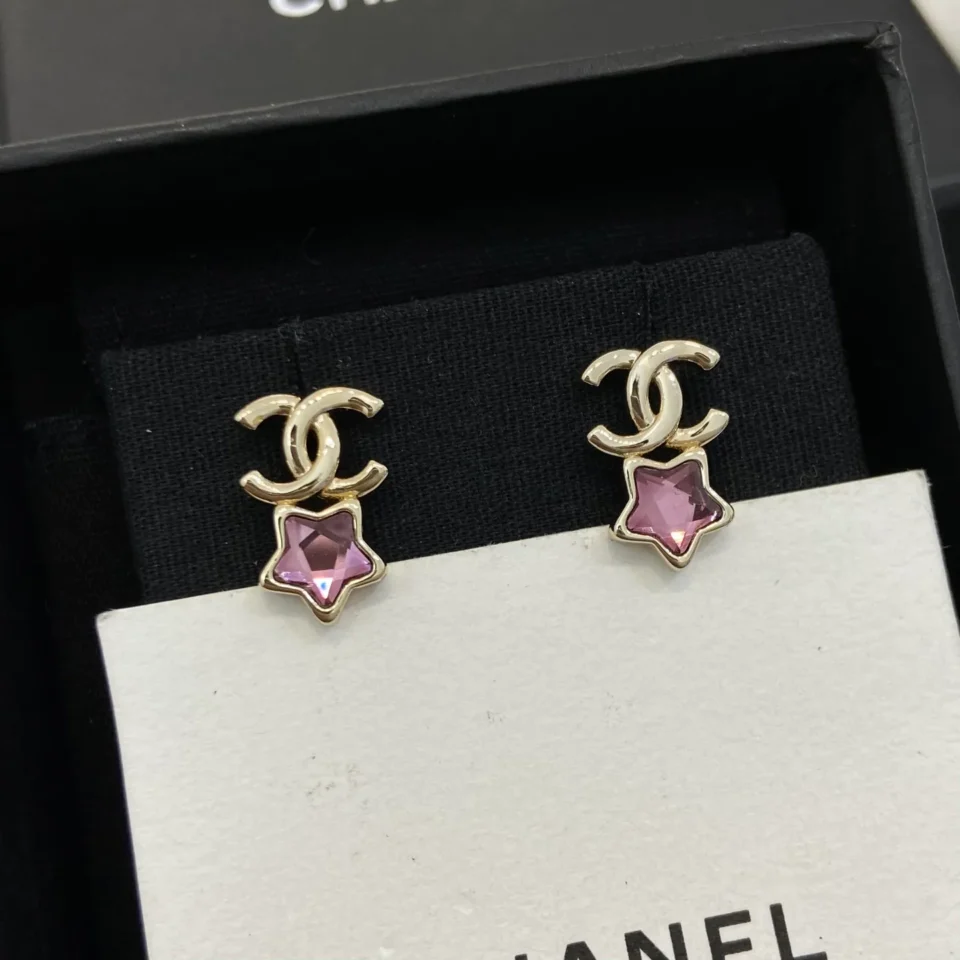 CHANEL earrings with purple stars