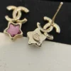 CHANEL earrings with purple stars