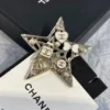 Chanel star brooch