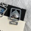 CHANEL perfume bottle earrings