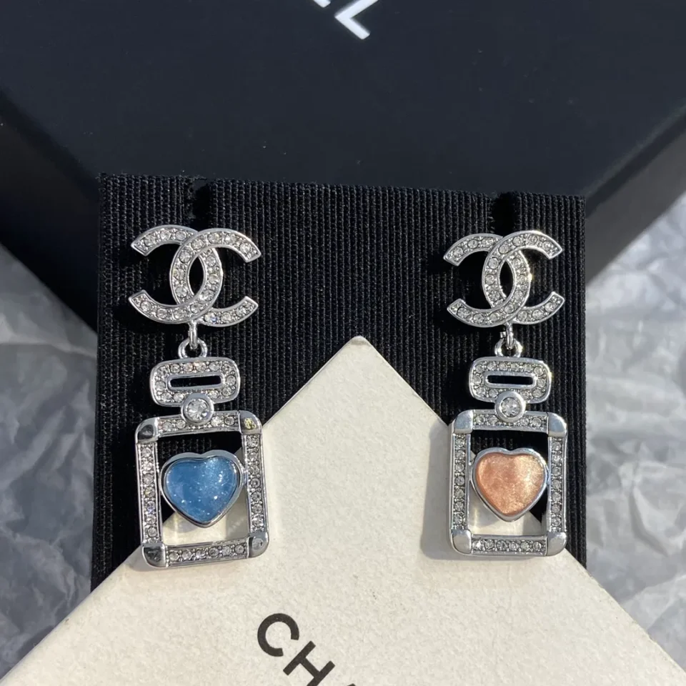CHANEL perfume bottle earrings with cc logo