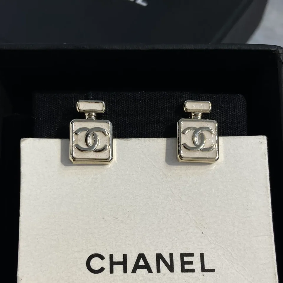 CHANEL white perfume bottle earrings