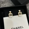 CHANEL black perfume bottle earrings