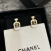 CHANEL black perfume bottle earrings