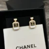 CHANEL black perfume bottle earrings