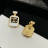 CHANEL black perfume bottle earrings