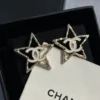 CHANEL star earrings with logo