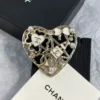 Chanel heart brooch