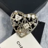 Chanel heart brooch