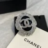 Chanel leather brooch