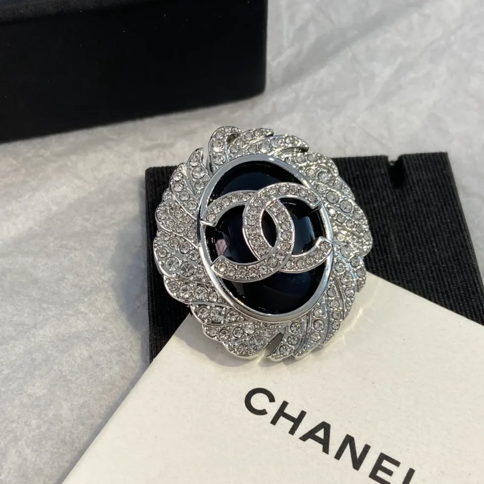 Chanel leather brooch